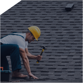 man working on roof